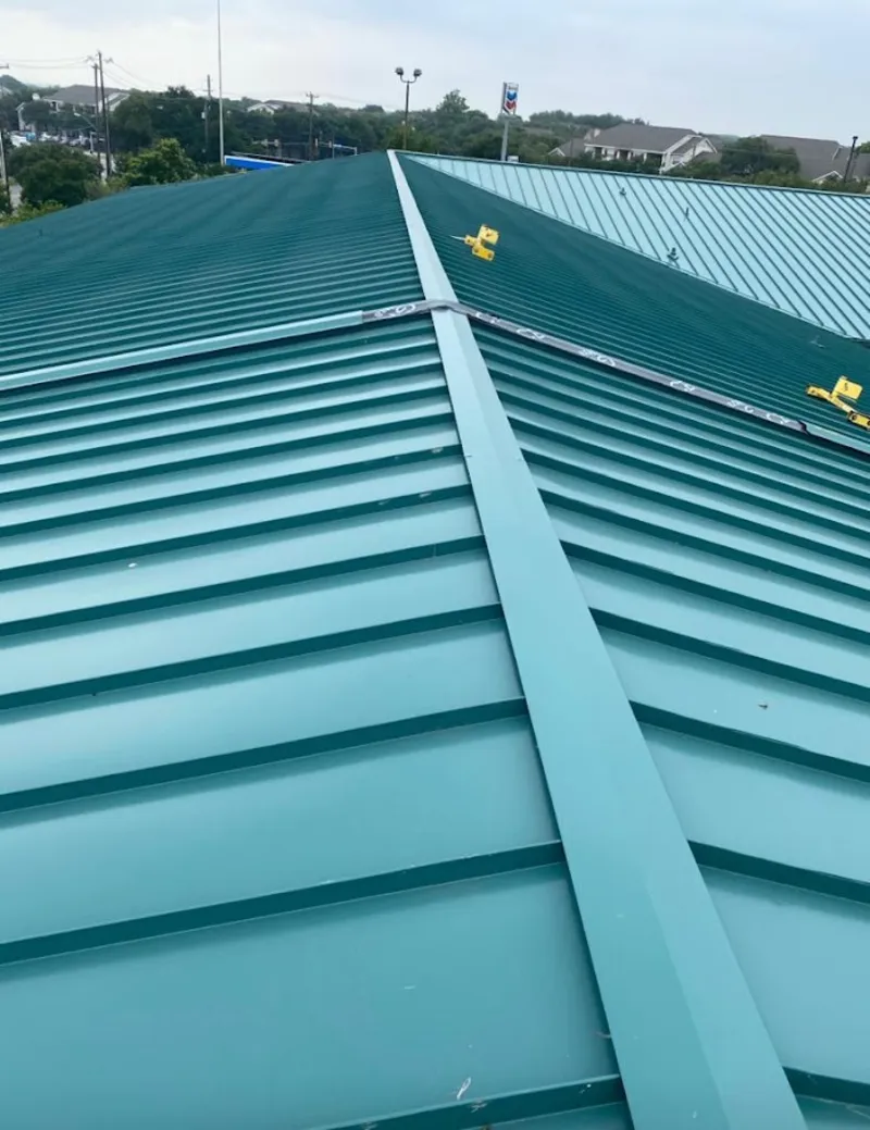 Green commercial metal roof ridge and valley for Metal Roof Repair in East Pikeland