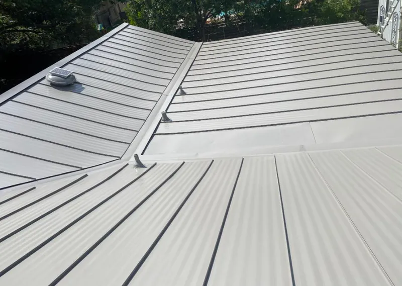 Solar attic fan installed on a metal roof for Roof Ventilation in East Pikeland